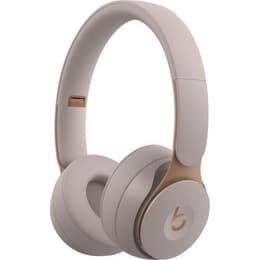 Casque réducteur de bruit sans fil avec micro Beats By Dr. Dre Solo Pro - Beige