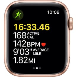 Apple Watch (Series SE) 2020 GPS 44 mm - Aluminium Or - Bracelet sport Lumière stellaire