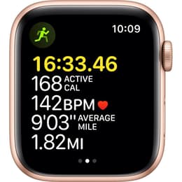 Apple Watch Series SE 1 (2020) GPS 44 mm - Aluminium Or - Bracelet sport Lumière stellaire